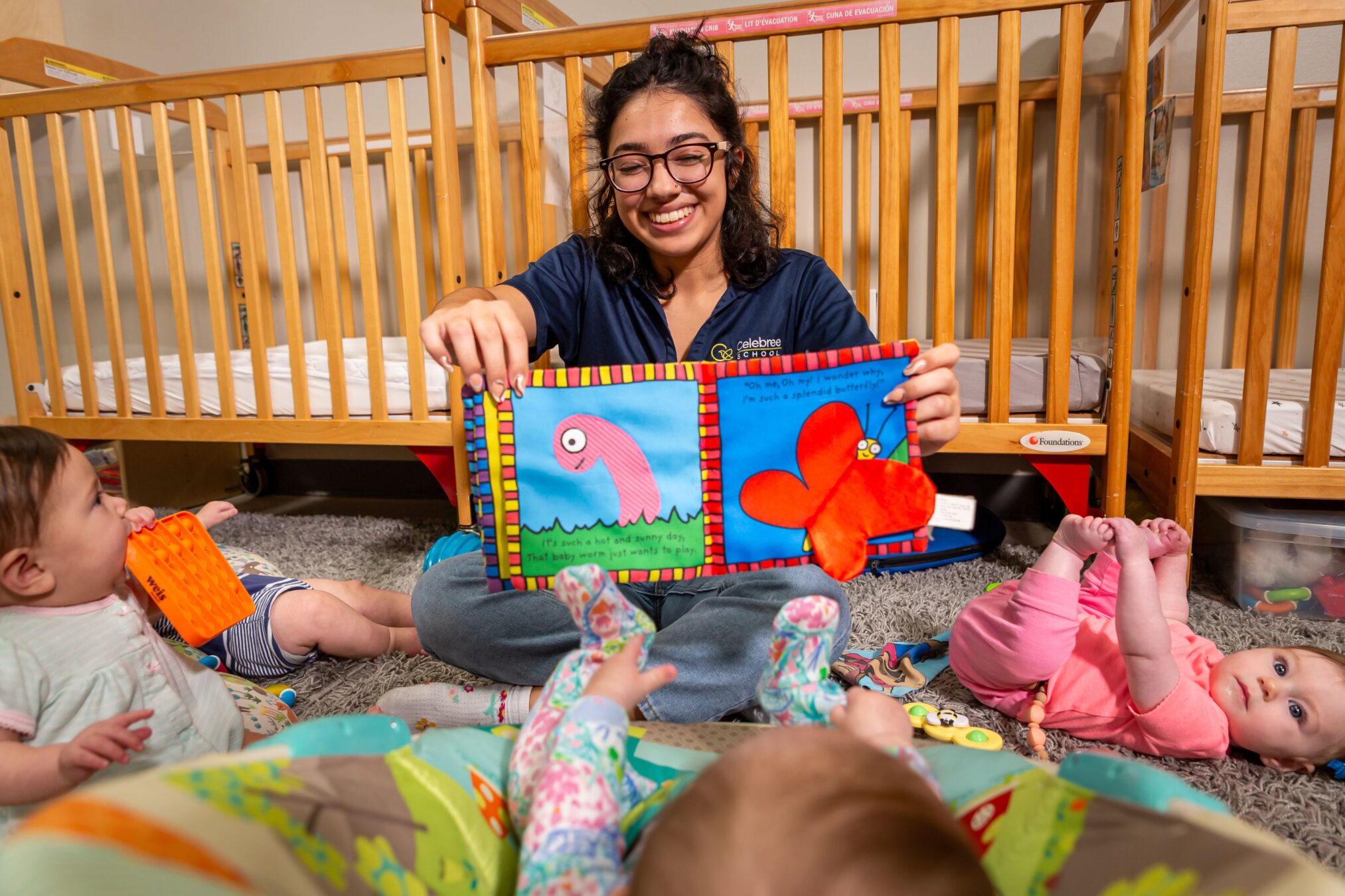 Infant Teacher reading to Infants