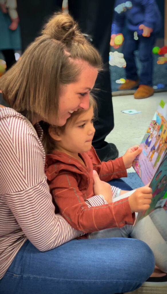 mother and daughter reading 